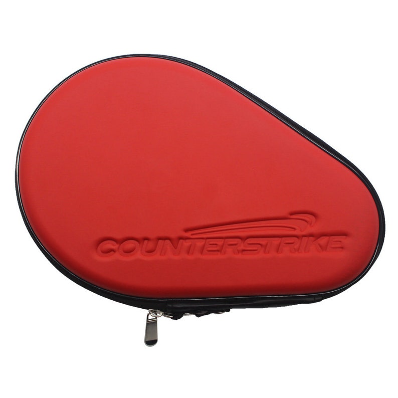 May include: Red ping pong paddle case with a black zipper and the word "COUNTERSTRIKE" embossed on the front.