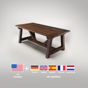 May include: A dark brown, rectangular wooden table with a trestle base. The table is constructed from thick planks of wood and has a rustic, farmhouse style. The table's dimensions are approximately 183 cm long, 91 cm wide, and 76 cm high.