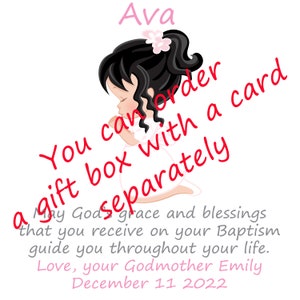 May include: A digital illustration of a girl with long black hair wearing a white dress and praying. The text "Ava" is at the top of the image. The text "You can order a gift box with a card separately" is written diagonally across the image. The text "May God's grace and blessings that you receive on your Baptism guide you throughout your life. Love, your Godmother Emily December 11 2022" is at the bottom of the image.