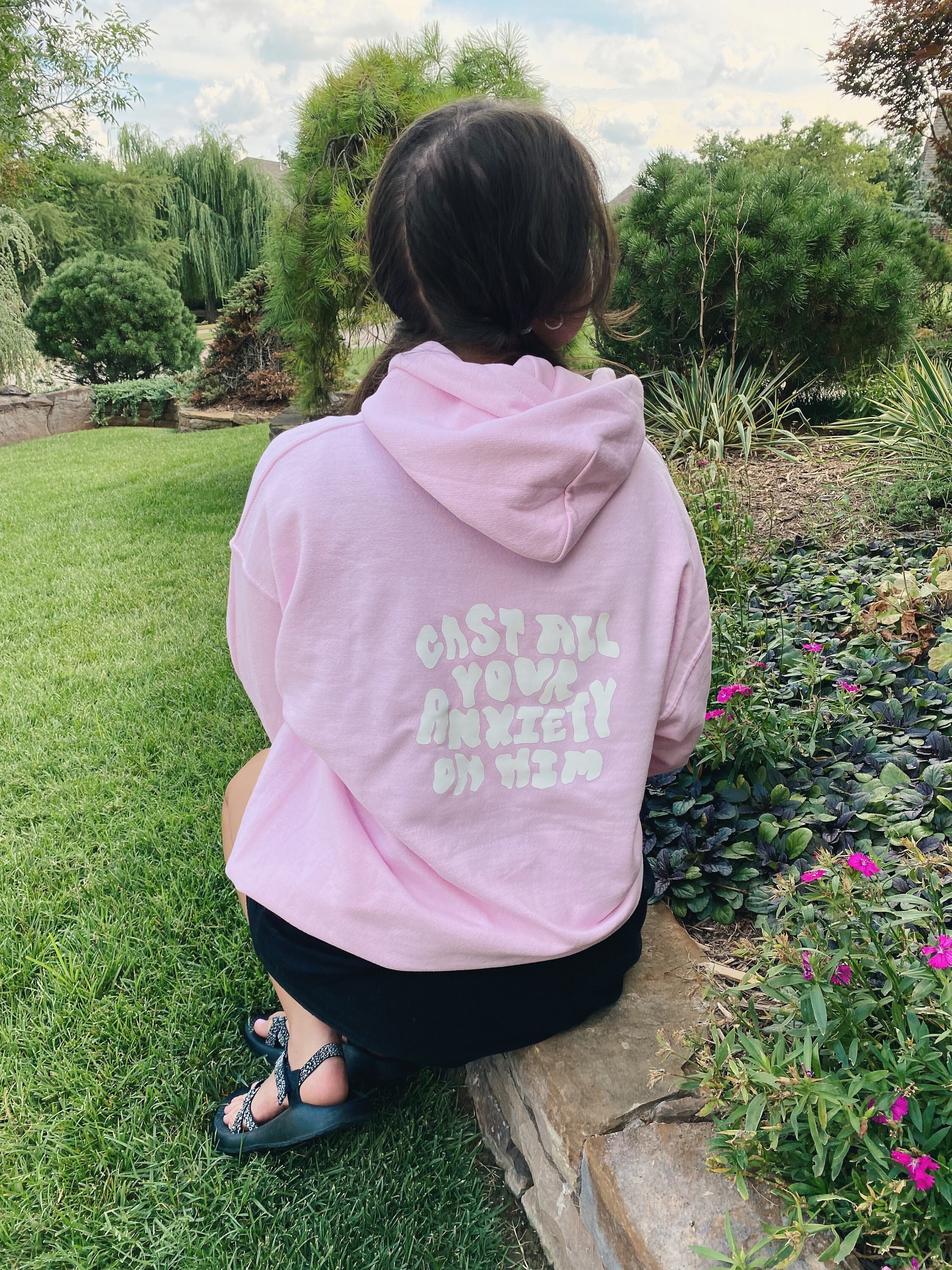 white hoodie with green writing
