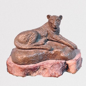 Reclining Lioness in Bronze