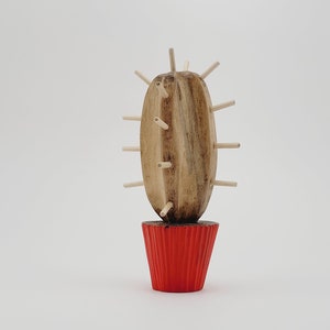 May include: Wooden cactus sculpture with brown wood and a red pot. The cactus has many small wooden spines.