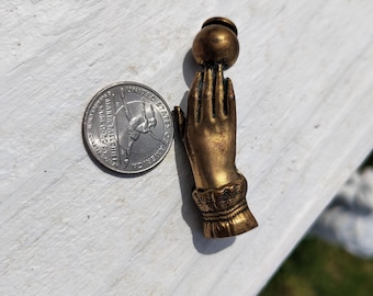 Vintage antique brass woman hand door knocker