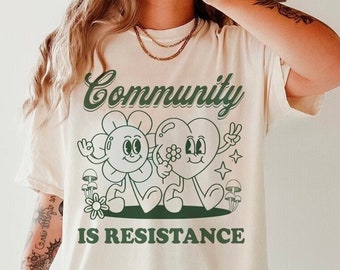 Community is resistance shirt | leftist | liberal democrat | political | retro cottagecore | feminist | activism | anti capitalism | housing