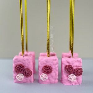 Floral themed rice krispie, roses rice krispy , table desserts, party favors, pretzels, cake pops, custom treats, birthday treats