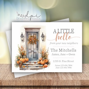 May include: Watercolor-style greeting card with a fall theme. The card features a blue door with a wreath, pumpkins, and the text "A LITTLE hello from your new neighbors." The Mitchells' names and contact information are also included.