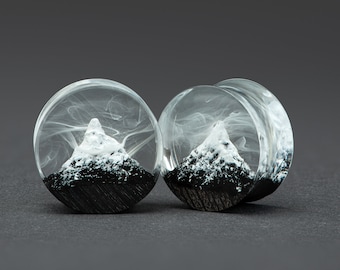 Mountain plugs, wood plugs, resin plugs, ear plugs, custom plugs, handmade plugs, ear gauges and plugs