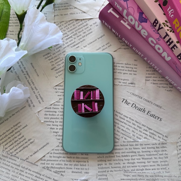 Pretty in Pink bookshelf phone grip