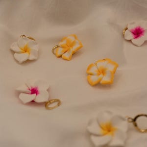 Gold plated plumeria flower huggies "Ruby“