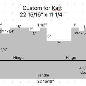 May include: A gray, custom-designed cabinet schematic for Katt, with dimensions of 22 15/16 inches by 11 1/4 inches. Features include a door, handle, and hinge placements, with detailed measurements in inches.