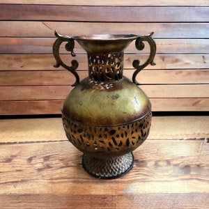 Bronze colored metal vase