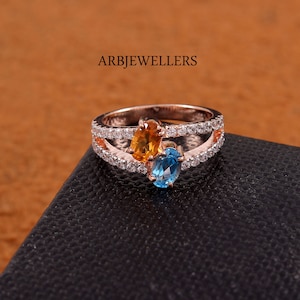 Handgemachter Ring aus Citrin und Blautopas: Rotgold über Sterlingsilber
