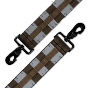 May include: Two brown and gray patterned straps with black metal swivel hooks. The straps have a repeating design of brown rectangles and gray squares. The black hooks are attached to the ends of the straps.
