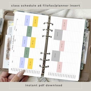 May include: An A6 planner insert featuring a class schedule grid with time slots from 6:00 am to 10:30 pm. The layout includes columns for days of the week with color-coded blocks in blue, yellow, green, gray, and pink representing various courses.