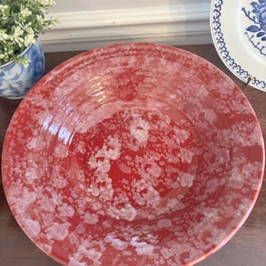 May include: A rustic wooden sign with the text "Welcome to our home" in white lettering. The sign features a distressed finish and a simple, inviting design, perfect for entryway decor.