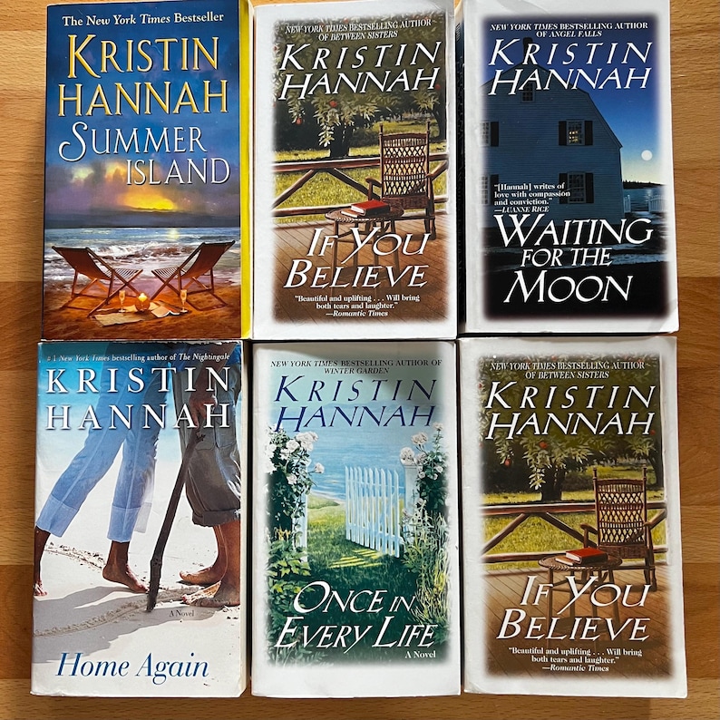 K&ouml;nnte beinhalten: Sechs Taschenb&uuml;cher von Kristin Hannah werden gezeigt. Die Cover zeigen Landschaftsillustrationen, wie einen Strand, ein Haus und einen Garten. Zu den Titeln geh&ouml;ren "Summer Island", "If You Believe" und "Waiting for the Moon".