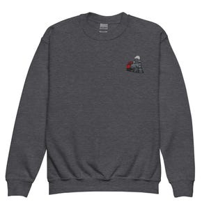 May include: A dark grey sweatshirt with a small embroidered image of a red and black steam engine train on the left chest.