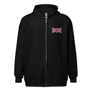 May include: Black zippered hoodie with a small Union Jack flag embroidered on the left chest.