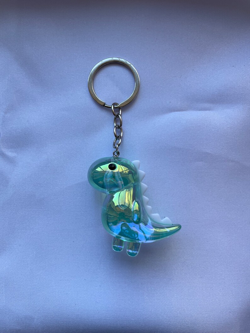 Dinosaur keychain transparentes Grün