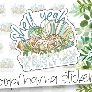 May include: A sticker with a seashell design and the text "Shell yeah your happy mail is finally here!"  The sticker is white with blue and green accents.