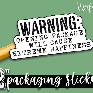 May include: A white sticker with black text that reads "WARNING: OPENING PACKAGE WILL CAUSE EXTREME HAPPINESS". The sticker is 2 inches in diameter and is designed for packaging.