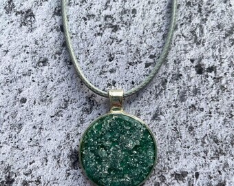 Round Jade Green and Metallic Silver Resin Pendant.