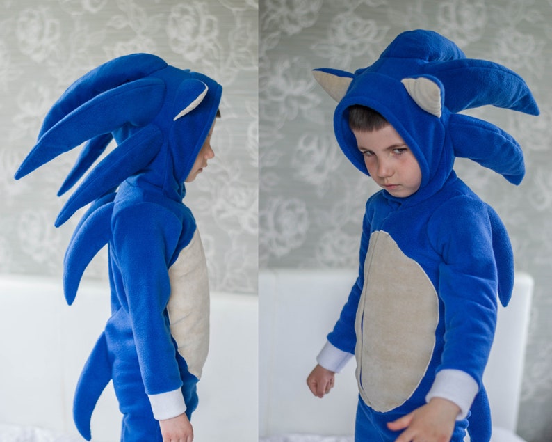 Blue hedgehog costume with front zipper, hood and spikes.