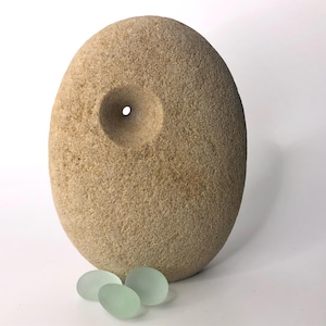 stone sculpture, pebble art, sculpture, contemporary art, decorative object, art piece