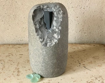 stone sculpture, pebble art, sculpture, contemporary art, decorative object, art piece