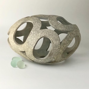stone sculpture, pebble art, sculpture, contemporary art, decorative object, art piece