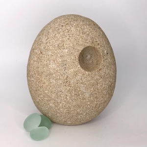 stone sculpture, pebble art, sculpture, contemporary art, decorative object, art piece