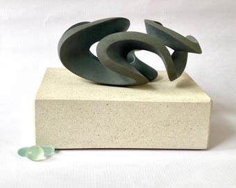 stone sculpture, pebble art, sculpture, contemporary art, decorative object, art piece