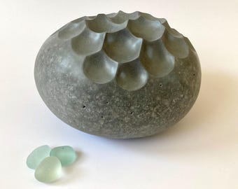 stone sculpture, pebble art, sculpture, contemporary art, decorative object, art piece