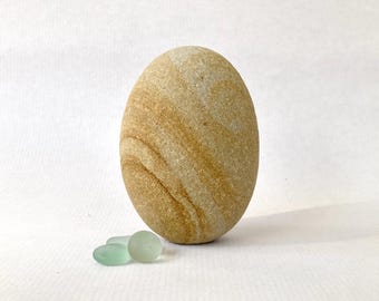 stone sculpture, pebble , sculpture, contemporary art, decorative object, art piece, pebble art