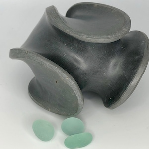 stone sculpture, pebble art, sculpture, contemporary art, decorative object, art piece