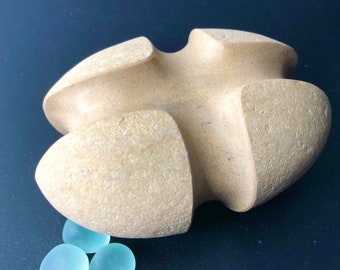 stone sculpture, pebble art, sculpture, contemporary art, decorative object, art piece