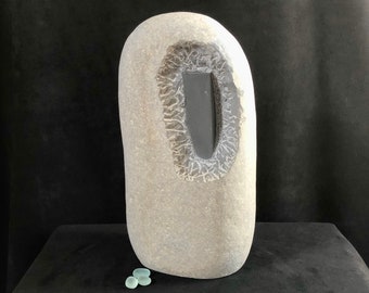 stone sculpture, pebble art, sculpture, contemporary art, decorative object, art piece