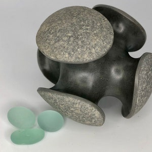 stone sculpture, pebble art, sculpture, contemporary art, decorative object, art piece