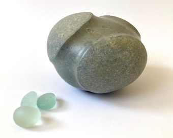 stone sculpture, pebble art, sculpture, contemporary art, decorative object, art piece