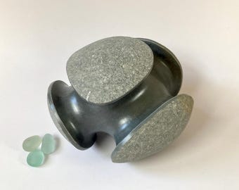 stone sculpture, pebble art, sculpture, contemporary art, decorative object, art piece