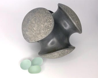 stone sculpture, pebble art, sculpture, contemporary art, decorative object, art piece