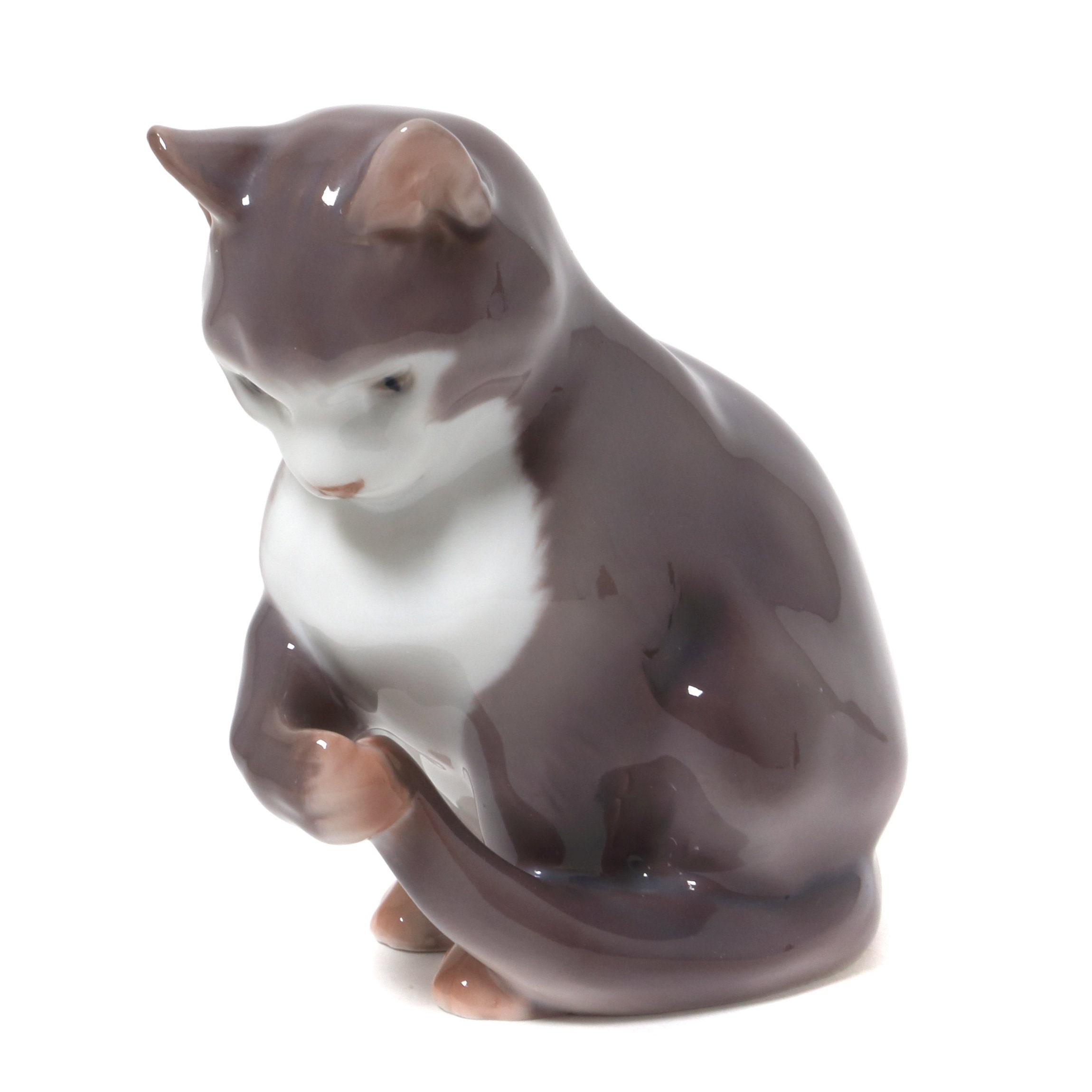 Porcelain figurine Kitten playing with tail. Etsy