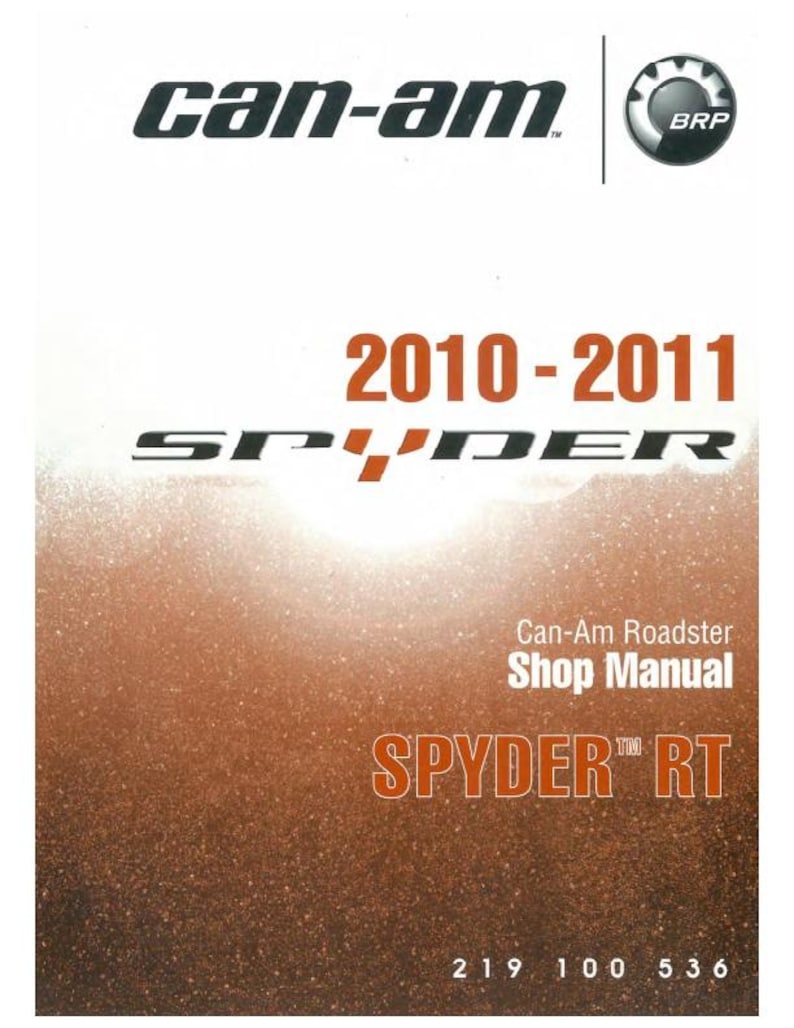 Puede incluir: Un manual de taller Can-Am Roadster para el modelo Spyder RT 2010-2011. La portada presenta el logotipo de Can-Am, el logotipo de BRP y el nombre del modelo en texto naranja. El fondo es un degradado de marr&oacute;n y blanco.