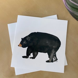 Carte de vœux vierge d’aquarelle d’ours noir