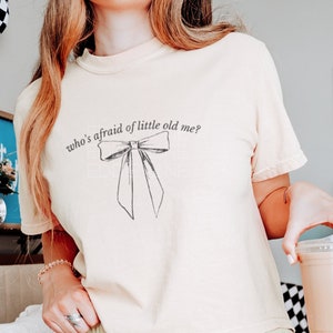 Original Coquette Who's Afraid? Women's Comfort Colors Tee | Of Little Old Me, Poets Department, Coquette Bow Tee