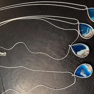 resin art pendant and necklaces
