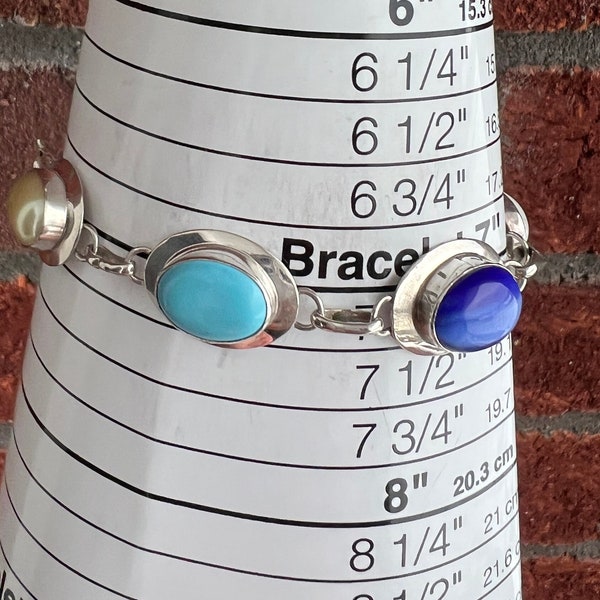 Various colored stones in this Silver Bracelet - Hallmarked  925 Sterling Silver