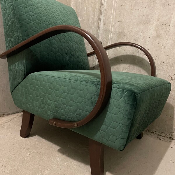 Vintage armchair designed by Jindřich Halabala