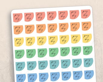 May include: A sheet of 49 colorful stickers with the words "pay day" written in black cursive on each sticker. The stickers are arranged in a rainbow pattern, with each row featuring a different color.