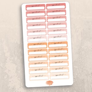 May include: A sheet of 20 peach, orange, and yellow appointment stickers with rounded corners. Each sticker has a blank space for writing in the appointment details. The text "appointment" is printed on each sticker.